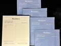 Biodance facial sheet masks in various packaging on a dark background