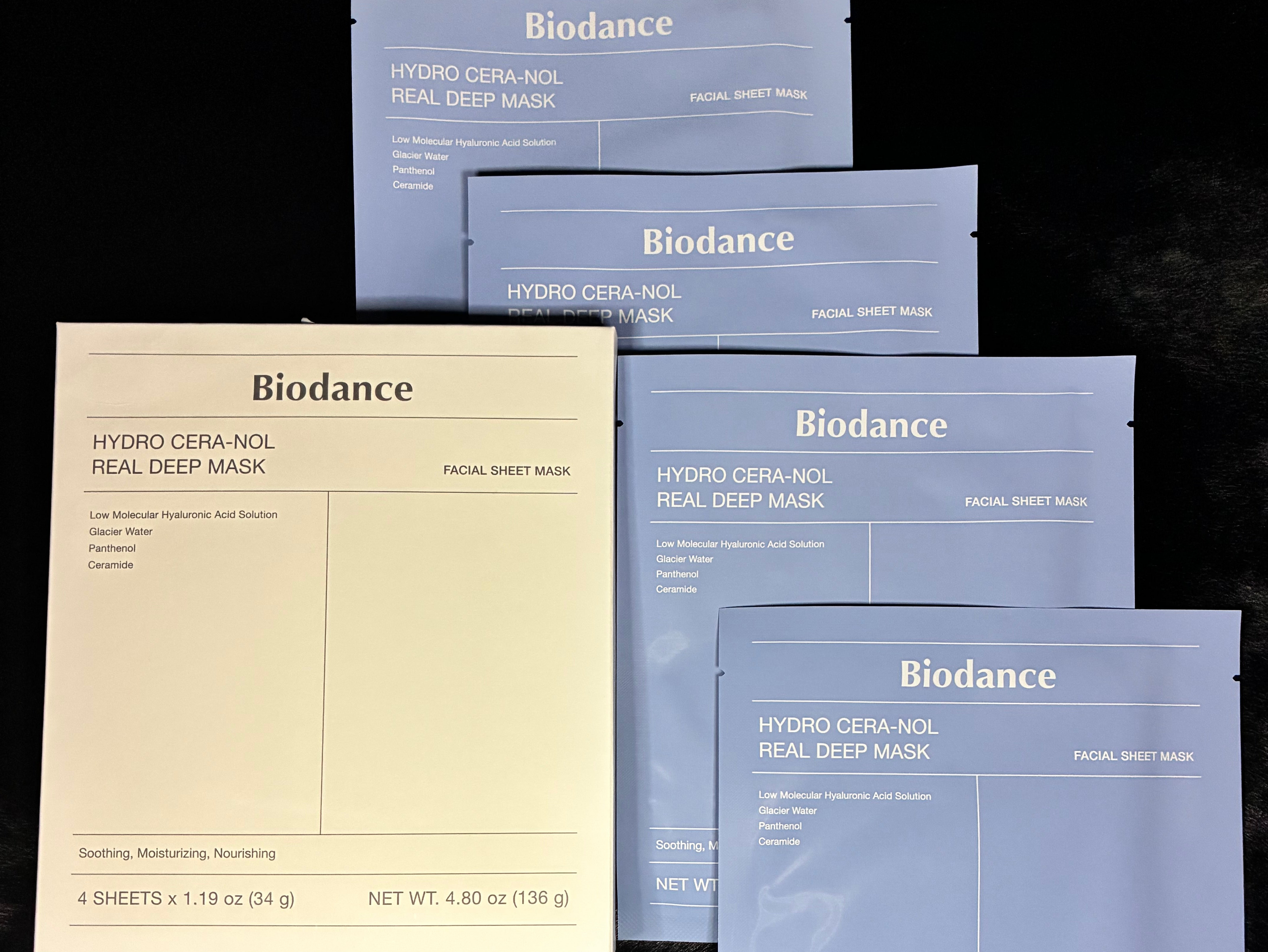 Biodance facial sheet masks in various packaging on a dark background